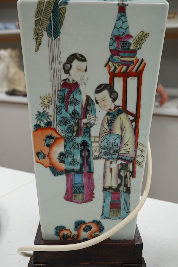 A Chinese famille rose table lamp, decorated with figures, 47cm high excluding the fitting. Condition - good